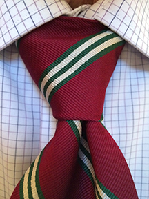 Custom designed ties by Barnard-Maine, Ltd tied iinto a Windsor Knot.
